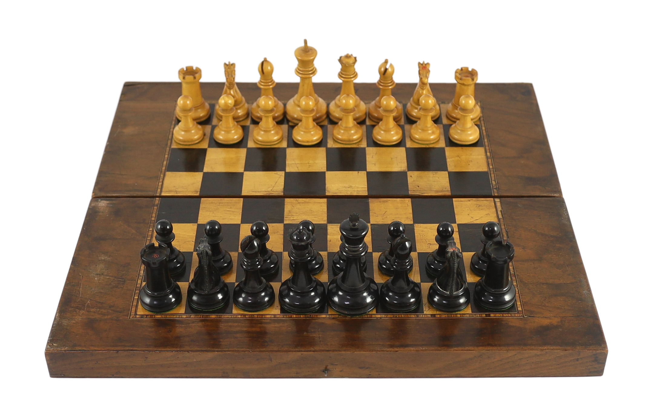 A Jacques ebony and boxwood Staunton pattern chess set, 44 x 39cm when open